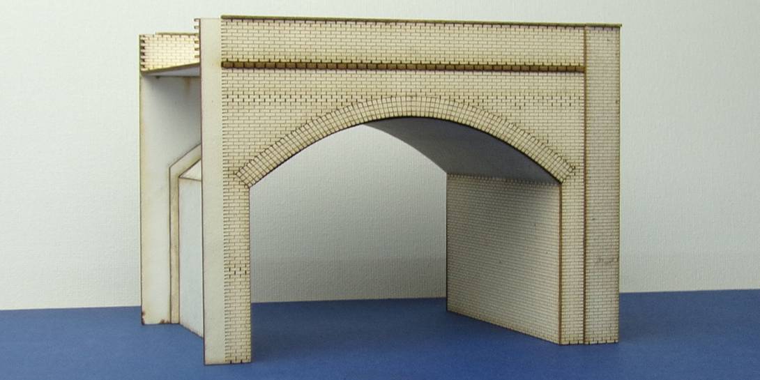 A 00-05 OO gauge double brick viaduct Double width brick viaduct which can accommodate double track though the opening.
